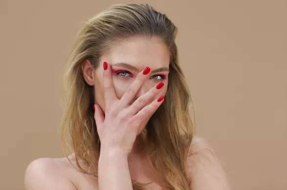 Woman with red manicure Woman with red manicure